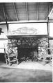 View of the large stone fireplace in the recreation room at Cape Creek Camp.