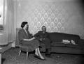 J. Robert Oppenheimer sitting with a woman