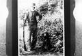 Man with dog and rifle