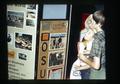 Children looking at Henderson images exhibit at Jefferson County Fair, Madras, Oregon, August 1972