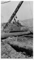 Siltcoos logging Co. on the Crown Willamette Sale 1924 Two men sitting on large log