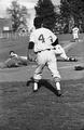 Oregon player sliding into home base