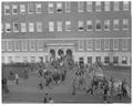 Student class change in front of Commerce Hall (Bexell Hall), November 1960