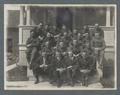 Lambda Chi Alpha members on steps of house