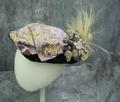 Hat of lilac silk satin with applique of yellow velvet, silk, and beads