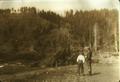 Enrollee with younger brother, S. of camp, barrack show