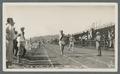 Martin, Knifton, and Booth running half mile circa 1920