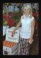 Susan Rodriguez with tomatoes, Lakeview, Oregon, 1975