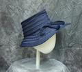 Hat of blue grosgrain and braided straw with large brim and self-fabric band and bow