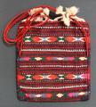 Handbag of horizontally striped woven wool with alternating patterned bands