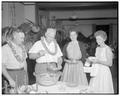 Serving punch at a president's summer session reception; Memorial Union