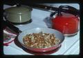 Fried potatoes in pan on stove, 1975