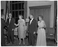 August Strand, Mollie Strand, Chancellor John Richards and Mrs. Richards greeting participants at the president's reception for faculty, Memorial Union