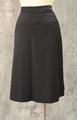 Skirt of navy wool with two welt pockets on front