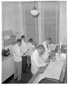 Pharmacy students in the laboratory, January 1960