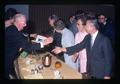 The Castles and the Wus congratulating Ralph Bogart at retirement dinner, Oregon State University, Corvallis, Oregon, 1974