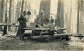 Hunters preparing food in camp