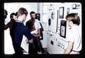 JARSI students and instructor looking at freeze dryer, Oregon State University, Corvallis, Oregon, circa 1965