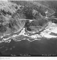 Oblique aerial view of Cape Perpetua area showing Devils Churn.