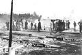 People viewing aftermath of fire at Seaside, Oregon