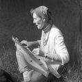 Woman playing a dulcimer