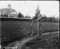E. E. Wilson with bicycle