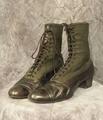 Boots of blackish-brown leather and dark green cotton faille upper