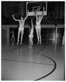 OSC basketball players Wade "Swede" Halbrook, Ron Robins, and Phil Shadoin