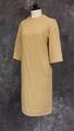 Dress; sheath of golden tan camel hair with wide, round neckline and wide, bracelet-length sleeves