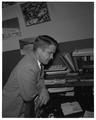 Unidentified member of the OSC News Bureau or Department of Journalism, 1956