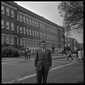 Gary Ford, a member of OSU's G.E. College Bowl team, posing outside of the Commerce Building