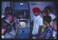 Junior Engineers and Scientists Summer Institute (JESSI) participants viewing electronic seed sorter, circa 1966