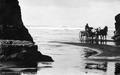 Man in horse drawn wagon, Hug Point, Cannon Beach, Oregon