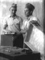 Carpentry Shop, Berea College: two students building cabinets