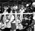 Tanya Lifa and Erica Reins blocking the net against UCLA