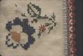 Dresser scarf with cross stitching by Mrs. Gawronski's mother, detail of rose