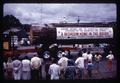 Spectators and logging truck at Philomath Frolic parade, Philomath, Oregon, 1963