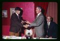 "Sather" congratulated by President Mack and Ralph Garren at Oregon School Employees Association meeting, Oregon State University, Corvallis, Oregon, circa 1970