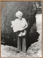 Mrs. Lou Falmer, 91 yrs. old in 1983, holding calendar given by White Rose Dairy to patrons. Started in 1930 after working for the Post Office as a Rural Carrier and serving in World War I.