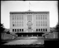 Jonesmore School, Portland. Front view of building with sidewalk and staircases in foreground.