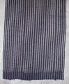Textile panel of indigo cotton with paired vertical stripes with wavy faded blue horizontal lines throughout the middle