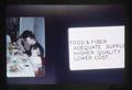 Image of Henderson Christmas dinner and image of Food & Fiber title slide duplicated on one slide, circa 1965