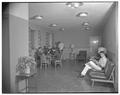 Students relaxing in the lounge of the new men's residence co-op, September 1954