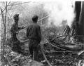 CCC crew members working as hosemen at a fire, Columbia National Forest, Washington