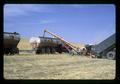 Transfering barley to PGG truck, Hawkins Ranch, Umatilla County, Oregon, circa 1970