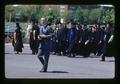 Dick Floyd with camera at commencement processional, Oregon State University, Corvallis, Oregon, 1974