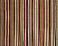 Wrap of hand-woven multi-colored striped cotton in a lightweight loose weave