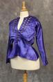 Blouse of purple satin with round neckline and plunging slit down front