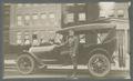 Sergeant Major Dennis Hayes with automobile, circa 1918