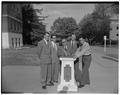 George A. Syriotis, editor of To Vima, (Athens, Greece newspaper) at center and son Toney, OSC Electrical Engineering sophomore, at right, with unidentified individuals. May 1, 1952